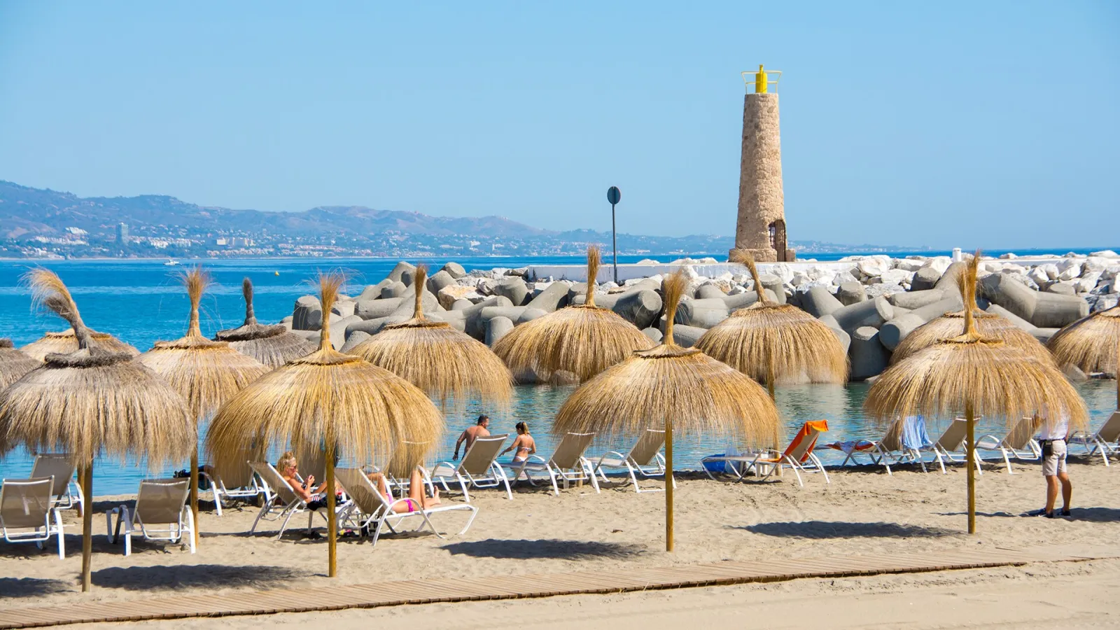 Playa Puerto Banús Beach with tranquil water & a cafe